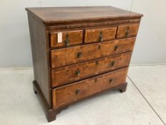 A George II walnut and isometric banded chest of drawers, width 99cm, depth 51cm, height 94cm.