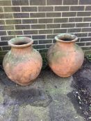 Two pairs of terracotta planters, larger height 58cm. Condition - fair, one baluster planter badly