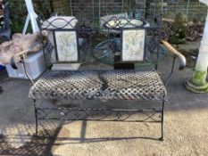 A folding metal garden bench with tile inset back, width 124cm, height 89cm. Condition - fair