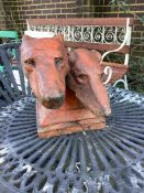 A terracotta garden ornament of two greyhound heads, height 28cm. Condition - fair to good