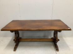An 17th century style rectangular oak refectory dining table, width 184cm, depth 91cm, height 78cm