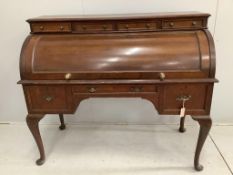 An early 20th century Continental oak cylinder bureau, width 136cm, depth 62cm, height 116cm.