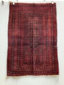 A Belouch red ground prayer rug, 145 x 100cm. Condition - fair, two small areas of moth damage