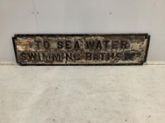 A vintage cast iron sign 'TO SEA WATER SWIMMING BATHS', originally from The Southport Lido, width