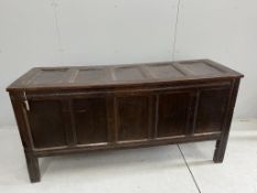 A large 18th century panelled oak coffer, width 171cm, depth 57cm, height 83cm. Condition - fair