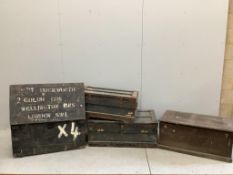 A Victorian rectangular pine trunk, three vintage iron bound storage boxes and a mahogany box.