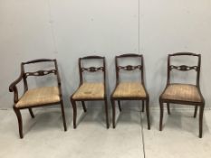A set of eight Regency brass mounted mahogany dining chairs, one with arms. Condition - poor to