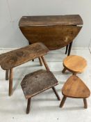 An early 19th century oak drop leaf table, height 60cm, two 19th century elm stools and two other