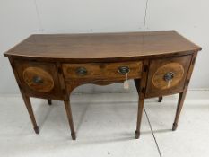 A George III satinwood banded mahogany bowfront sideboard, width 152cm, depth 70cm, height 91cm.