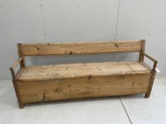 A 19th century Continental pine box seat settle, width 197cm, depth 38cm, height 84cm. Condition -