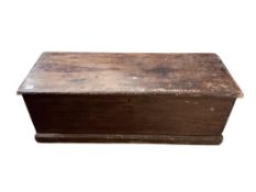 A 19th century rectangular pine trunk, width 124cm, depth 46cm, height 45cm