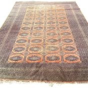 A Bokhara peach ground carpet, 340 x 260cm