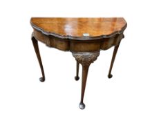 A Queen Anne Revival walnut folding card table, width 88cm, depth 44cm, height 74cm