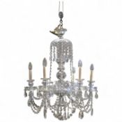 A cut glass five branch chandelier with drops
