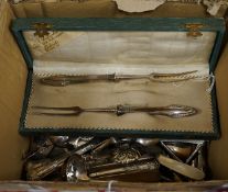 A cased pair of Art Nouveau 800 standard white metal handled steel serving forks, 20cm, together wit