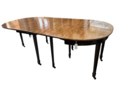 A George III and later mahogany D end extending dining table, width 217cm extended, one spare leaf,
