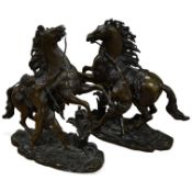 After Guillaume Coustou (1677-1746), a pair of bronze Marly horses, late 19th century, 40cm high