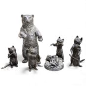 An Elizabeth II silver four piece miniature cat band by S.J. Rose & Son, Birmingham, 1976, tallest 5