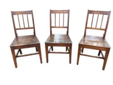 A set of six George III Provincial fruitwood and mahogany dining chairs