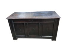 An early 18th century panelled oak coffer, width 120cm, depth 54cm, height 66cm