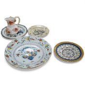 Two 18th century English delftware plates or dishes and two pearlware dishes, together with a Spode