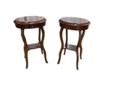A pair of Louis XVI style oval gilt metal mounted walnut two tier occasional tables, width 45cm, dep