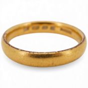 A George V 22ct gold wedding band, London, 1924, size L, 3.8 grams.
