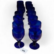 A collection of fourteen Bristol blue glass rummers, largest 15cm high