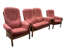 An Ercol elm three piece suite, settee width 130cm, depth 68cm, height 104cm