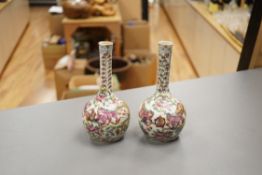 A pair of Chinese famille rose bottle vases, 19th century, 7cm high