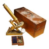 A late 19th century brass compound monocular microscope, by R and J. Beck, mahogany cased, with