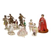 Nine continental figurines, to include Dresden porcelain lace examples, together with a resin