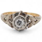 A yellow metal and illusion set single stone diamond ring, stamped 18ct & plat, size M, gross weight
