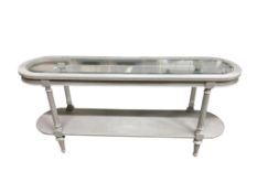 A painted two tier glass top console table, width 146cm, depth 35cm, height 67cm
