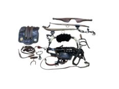 A group of 19th century agricultural items, a shire horse show bridle, etc