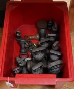 Twenty-four Georgian and later bronze bell weights, largest 7lb, some with Royal Cyphers for