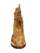 Pierre Decorse (b.1953), a naturalistically modelled sculpture of a fairytale castle emanating