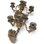 A pair of cast brass three branch wall sconces, 27cm deep