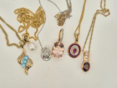 A modern 10k white metal and diamond chip set scroll pendant, 12mm, on a 10k white metal chain, (