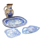 A quantity of Victorian blue and white pottery and a large Worcester jug, meat platters 45cm wide