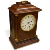 An early 20th century mahogany mantel clock, the dial inscribed Hyde & Sons, Sleaford, 41cm high