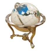 A modern globe on a chromed stand with inset minerals, 12 inch diameter globe