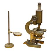An early 20th century brass compound monocular microscope, by R & J Beck, Ltd., London, number
