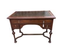 An early 20th century William and Mary style rectangular mahogany writing table, width 106cm,