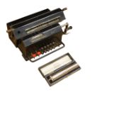 A Swedish Facit mechanical adding calculating machine, together with an Otis King’s calculator,