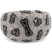 A recent 9ct white gold and two colour diamond cluster set dress ring, of abstract design, size N/O,