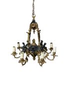 An eight branch gilt metal electrolier, cast with cherubs, width 60cm
