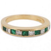A recent 18ct gold, six stone emerald and five diamond set half hoop ring, size M, gross weight 4.