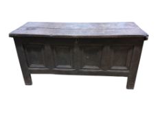 An 18th century panelled oak coffer, width 144cm, depth 54cm, height 72cm
