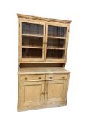 A Victorian pine dresser with glazed upper section, width 110cm, depth 43cm, height 190cm